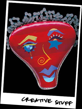 Bicycle seat mask sculpture